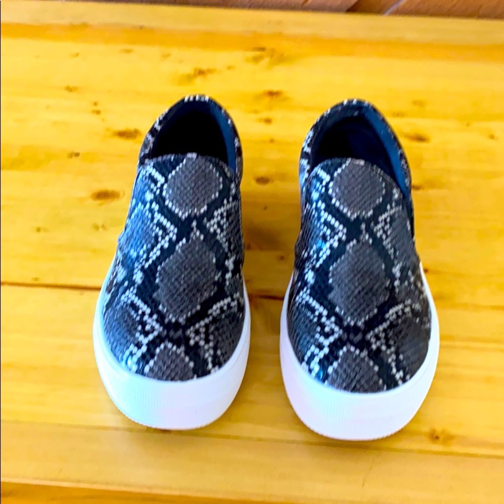 Steve Madden slip ons , brand new never worn .